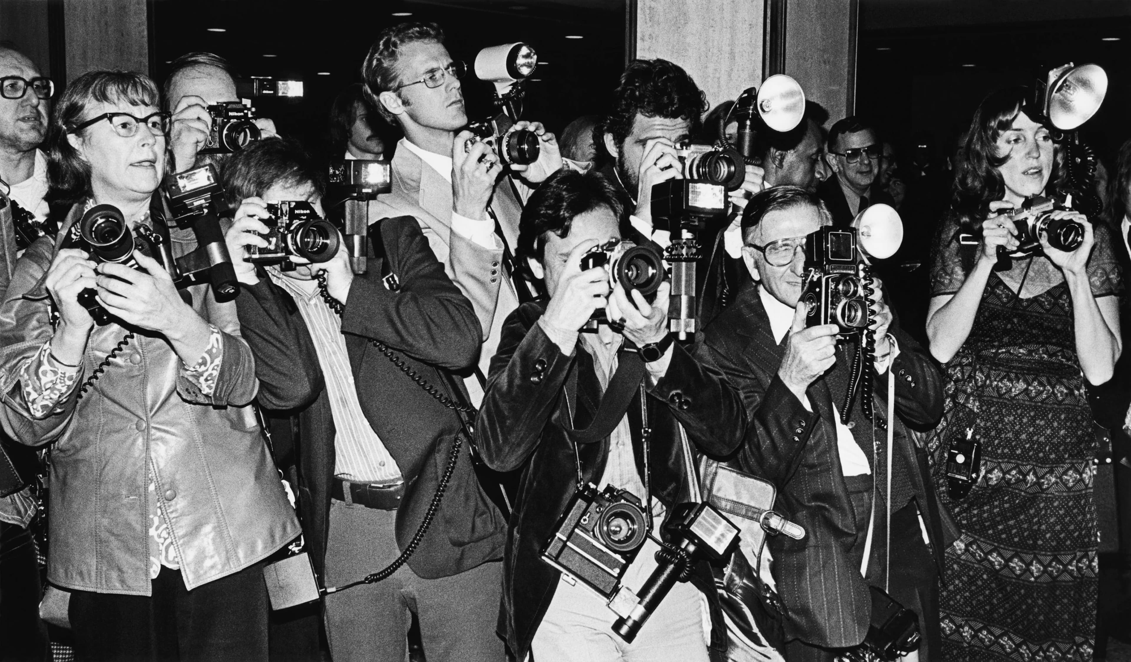 Where does the term "paparazzi" come from?